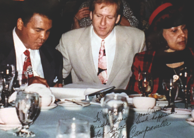Mark at a charity dinner with Muhammad Ali