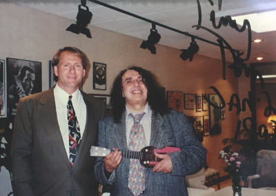 Mark posing with music client, Tiny Tim