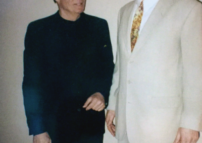 Mark standing with Adam West